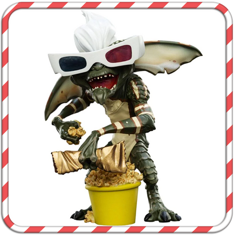 A limited edition Gremlins Weta figure (only 1000 made) of Stripe, eating popcorn.