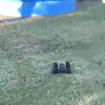RC car running through grass