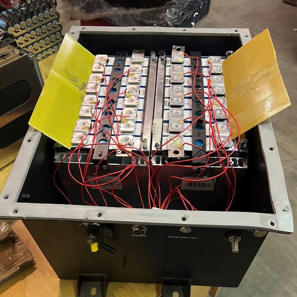 A golf cart battery with laser-welded bus bars