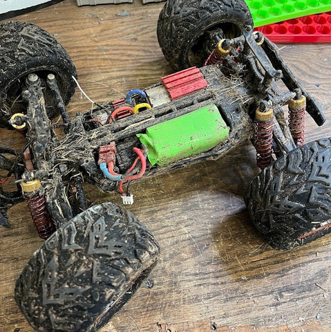 RC truck witht the body removed to show the lithium-ion battery.