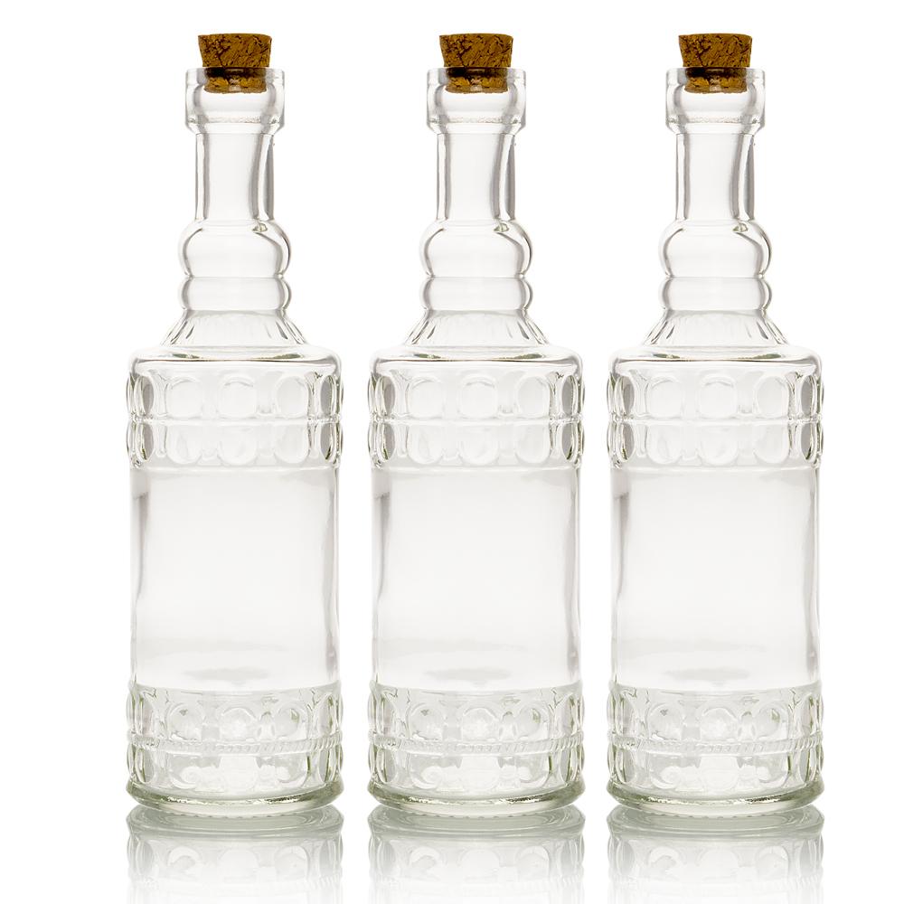 https://cdn.shopify.com/s/files/1/0469/3629/3530/products/3-pack-clear-vintage-glass-bottle-calista-flower-vase_1600x.jpg?v=1603772239