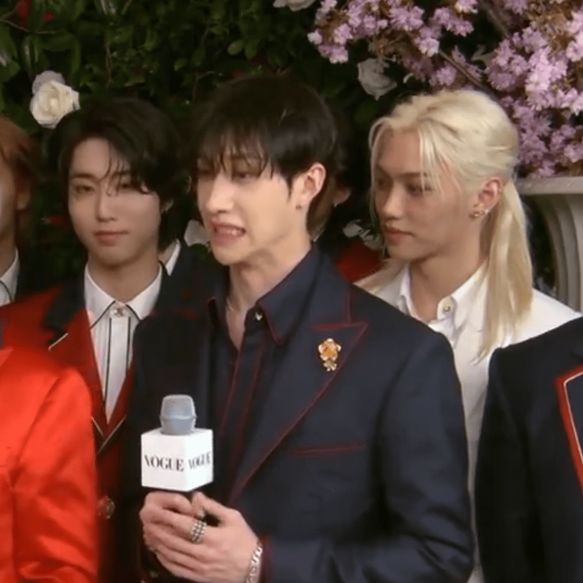 Bang Chan pulling a grimace at Met Gala Interview