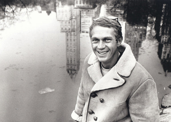 Steve McQueen wears a suede shearling coat in Central Park, New York City, 1961.