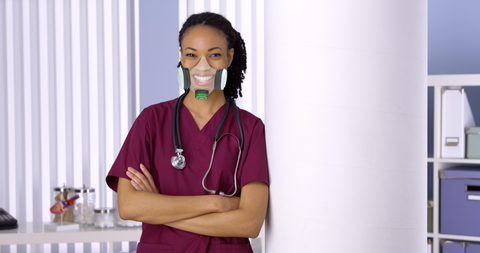 Nurse wearing a transparent face mask