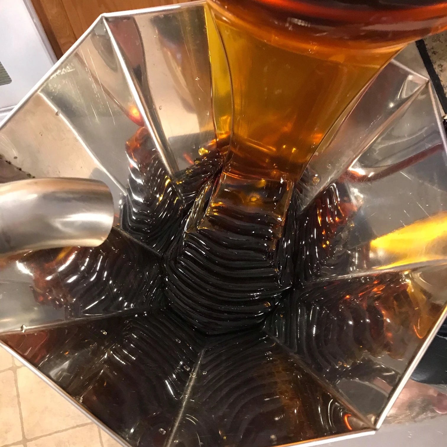 pouring cooled syrup to make the best vt maple cream