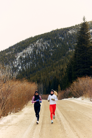 Savannah and Katie run in Colorado.