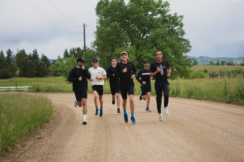 Connor runs with his teammates in Boulder.