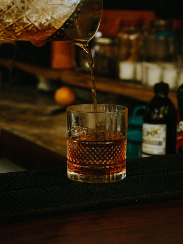 alcohol free rum being poured into a glass