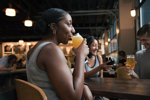 woman tasting alcohol