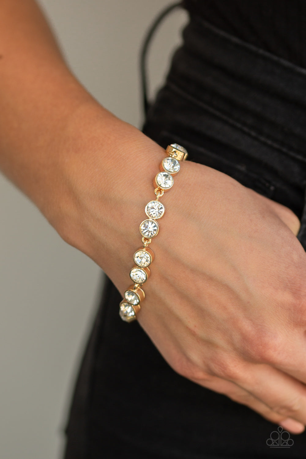 By All Means - Paparazzi - Gold Frame White Rhinestone Tennis Bracelet