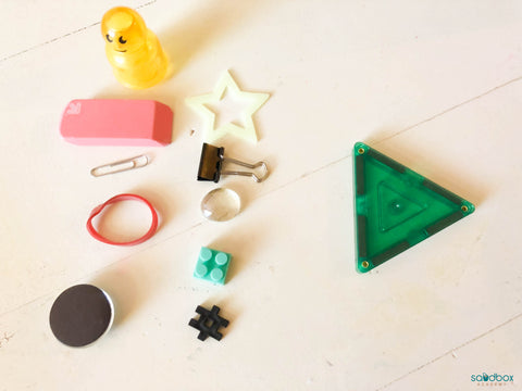 group of items some magnetic and some not. Magnetic tile activity