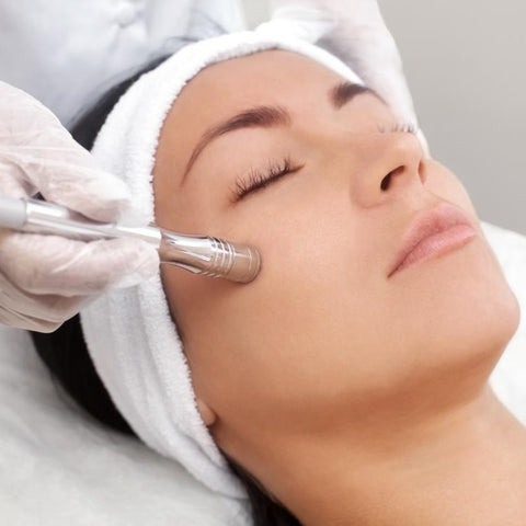 Lady whose face is being treated for Hyperpigmentation