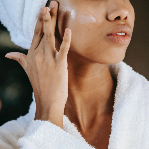 Lady applying Retinol