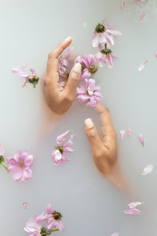 Lady having a bath with some flowers