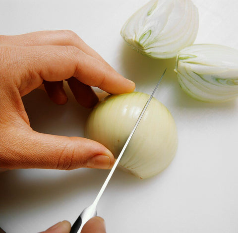 How to slice an onion into quarter cut