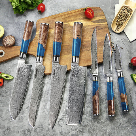 Executive Damascus Knife Set featuring a sharp paring knife ideal for precision cutting of artichokes