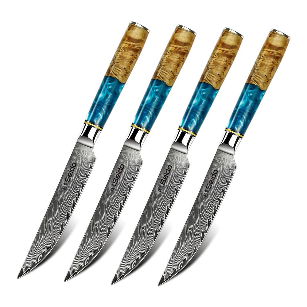 Seido Knives' 4-Piece Executive Blue Resin Steak Knives on a white background