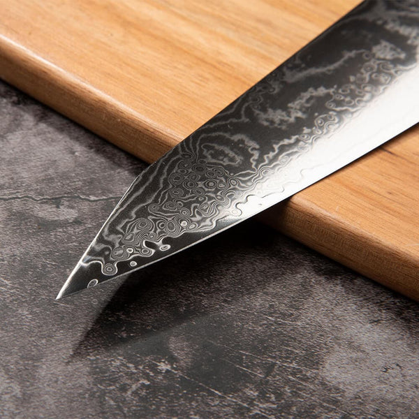 Meisai Kiritsuke Damascus knife blade detail