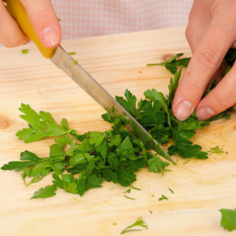 Use knife to separate leaves from stems