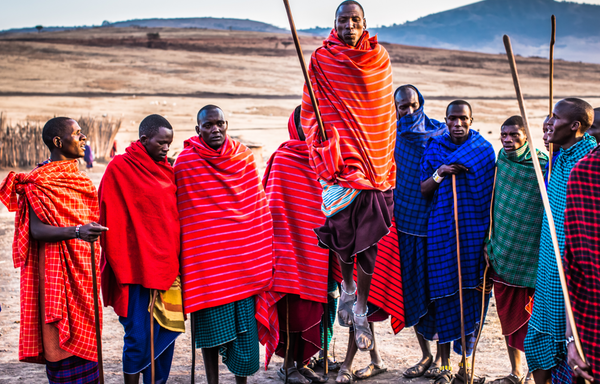 Maasai men from kenya wearing their iconic maasai shuka