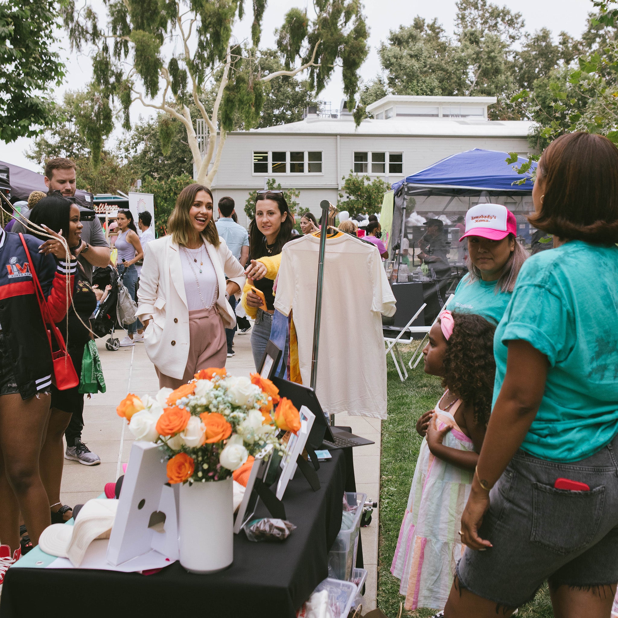 Fee talking to Jessica Alba at the MindfulFee booth