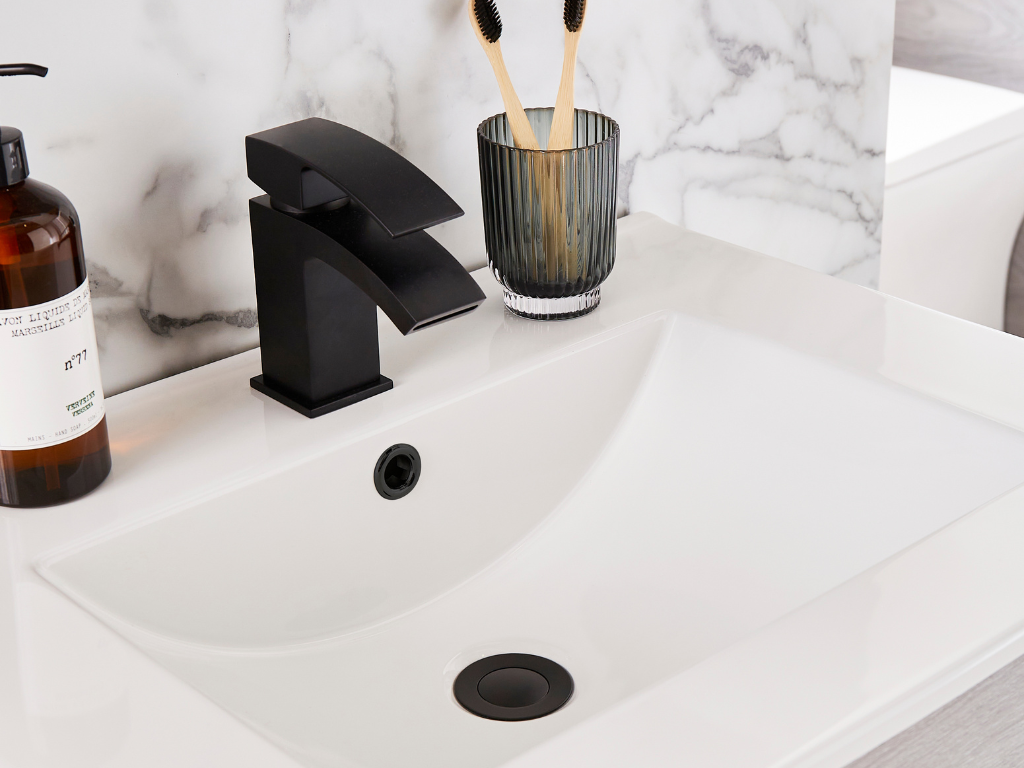 shelving in small cloakroom with towels and toiletries - maximizing space