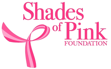 The Shades of Pink Foundation logo. It is a pink breast cancer ribbon in the lower left corner, and a pink font.