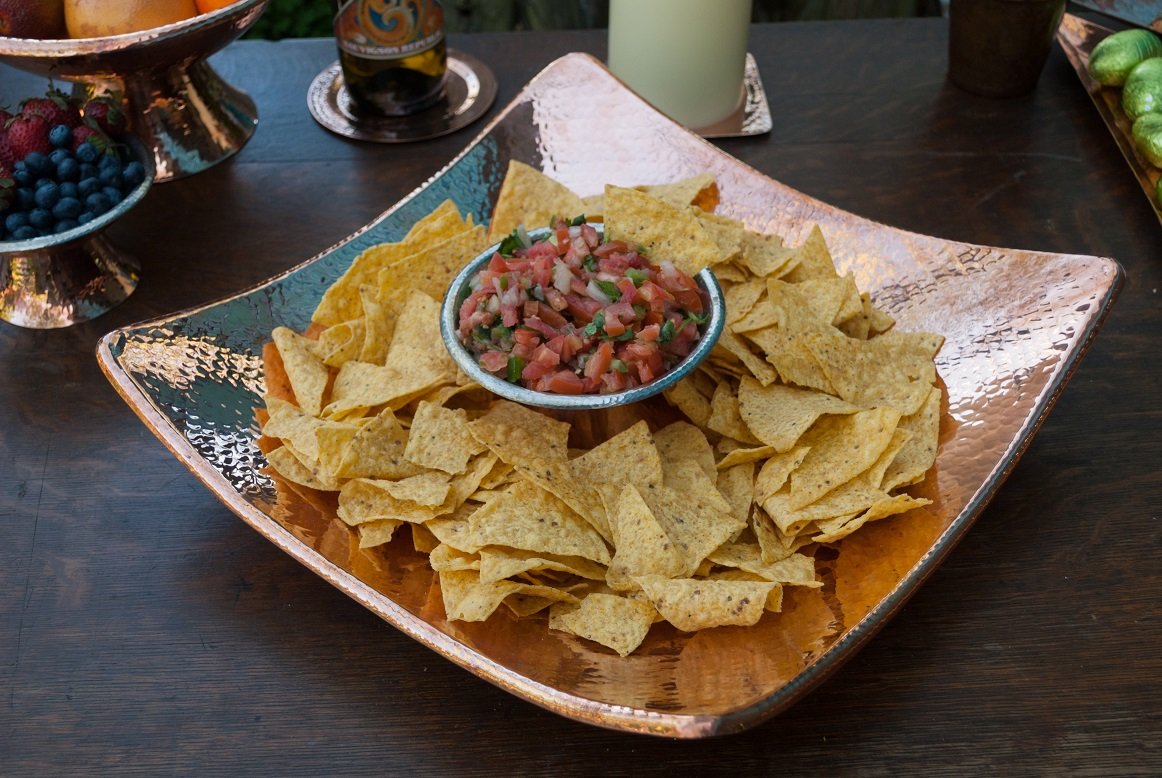 Easily serve up snacks and appetizers with pride when you use our Flat Earth Copper Bowl.