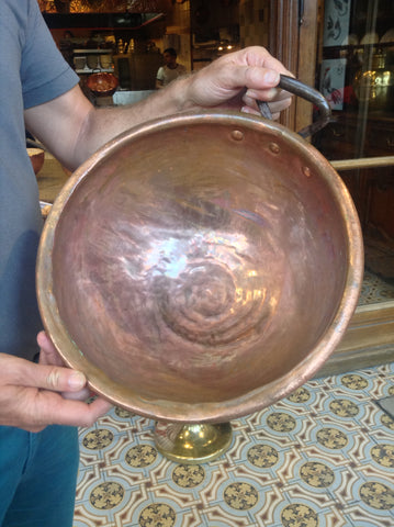 A close up look at the copper mixing bowls the French chefs use at the famous omelette house, La Mere Poulard's.