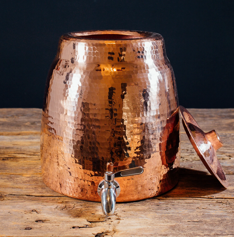 Hand hammered copper water dispenser