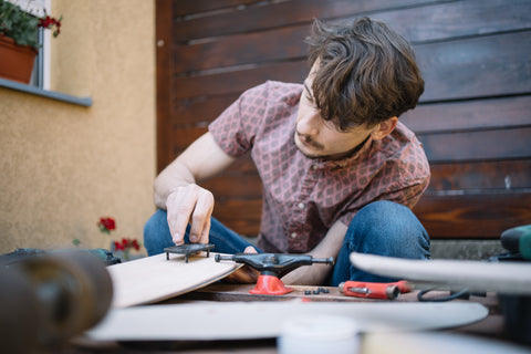 skateboard tools being used