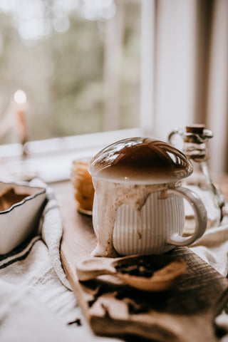 pumpkin spice autumn inspired latte in mushroom mug