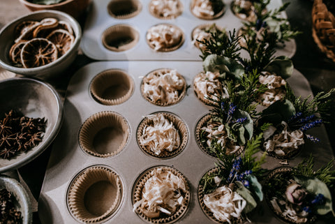 muffin tins filled with natural ingredients for fire starter diy