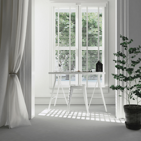 Inside someones home facing towards a window letting light and sun in - home fragrance