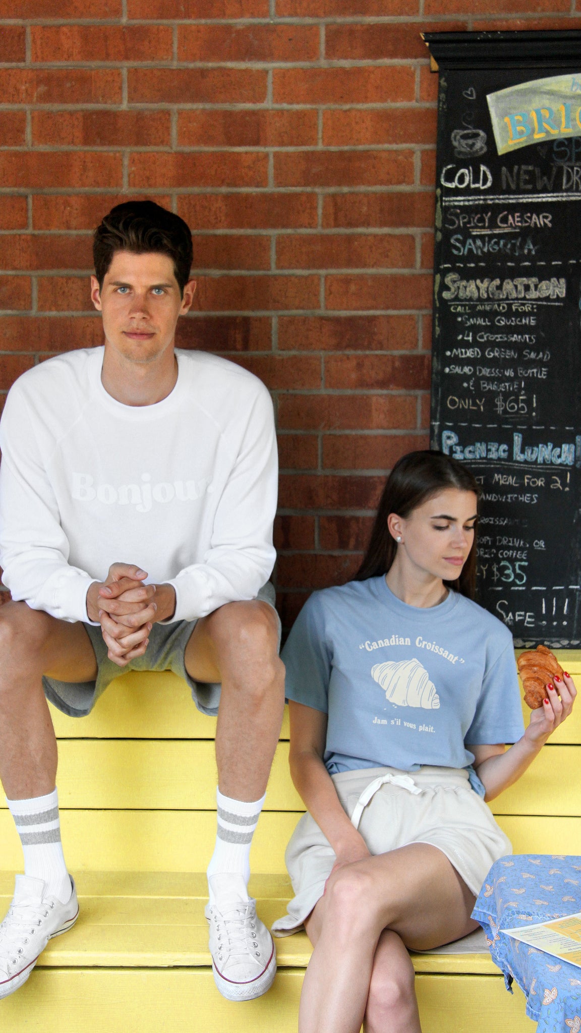 couple sitting on bench 