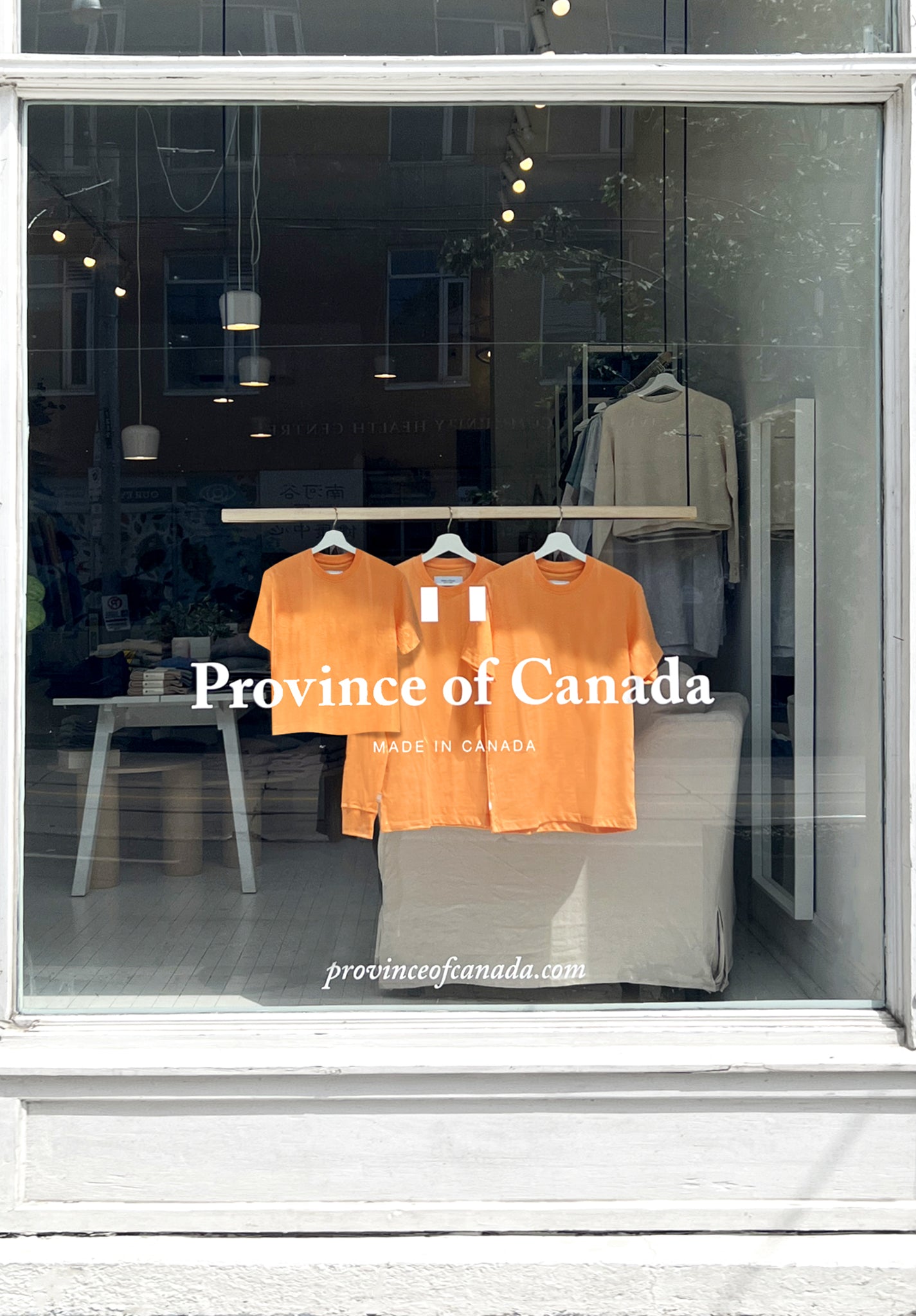 store front with orange collection