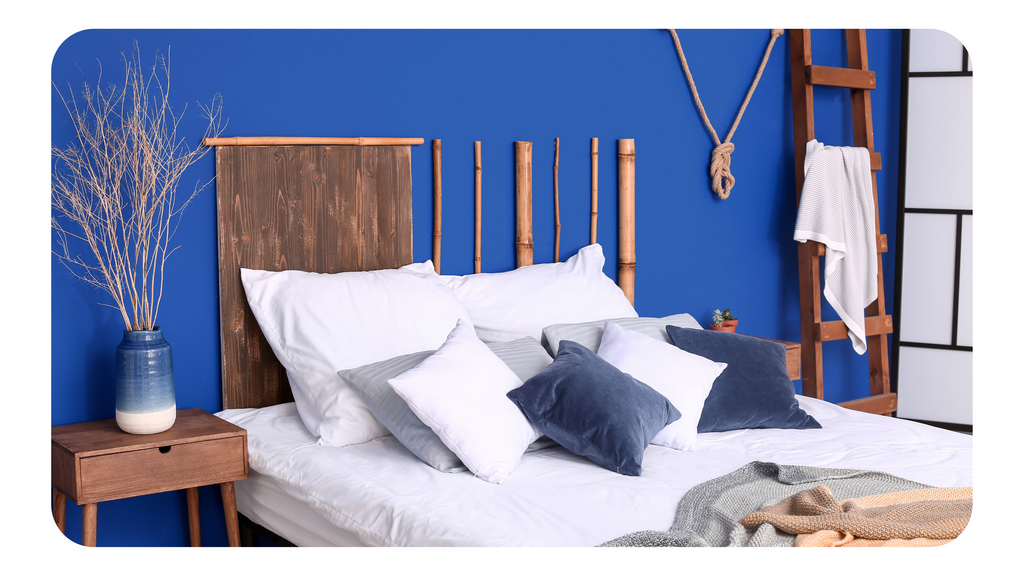 Average Bedroom Size (Photo of Blue Bedroom with White Sheets)