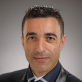 Dr. Fathi Karouia