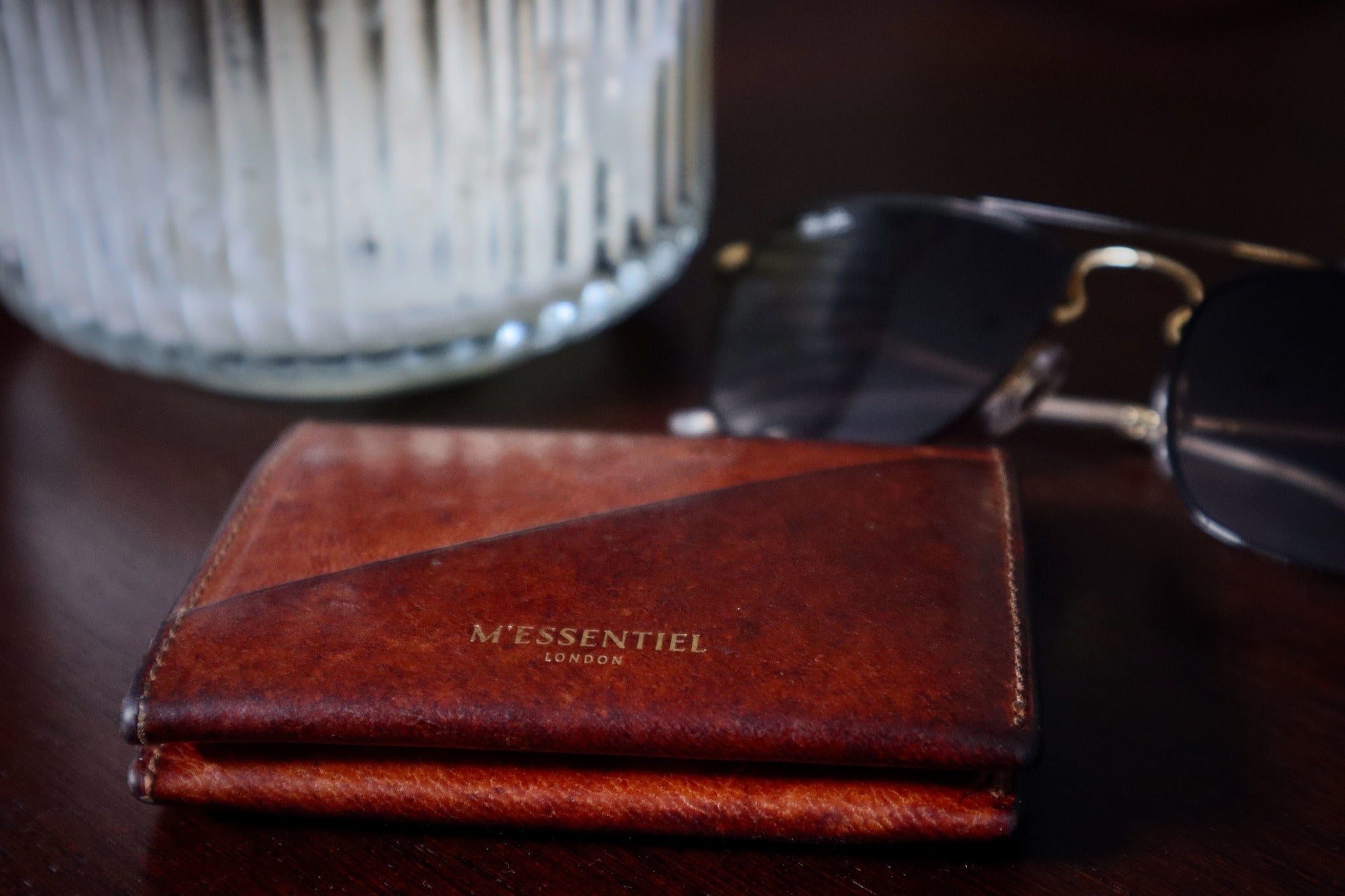 Mens deerskin leather wallet with rich patina after a few years of use.