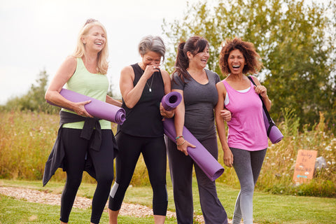 Group Of Mature Female Friends Outdoor Walking.