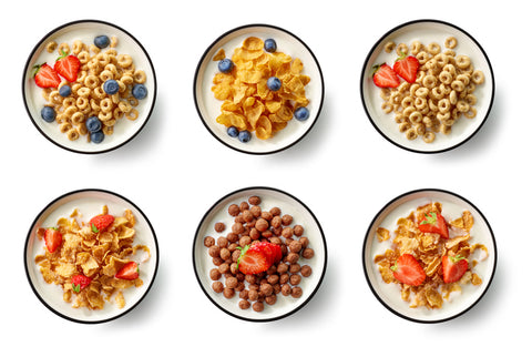 six cereal bowls on a table