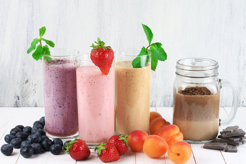 Fruit smoothies on a table.