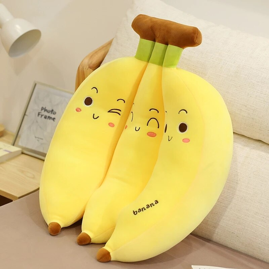 https://cdn.shopify.com/s/files/1/0472/9900/2520/products/BananaPlush_PlushieKawaii_6.png?v=1637139124&width=533