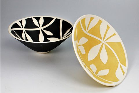 yellow and black handmade porcelain bowls