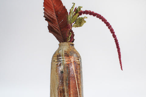 ceramic vase with dried flowers