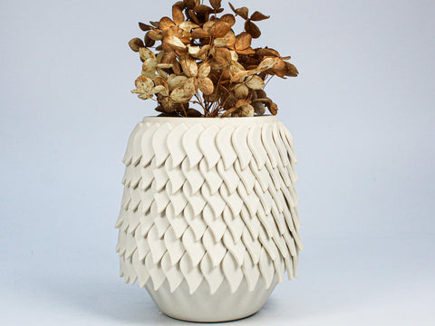ceramic vase with individual pottery petals