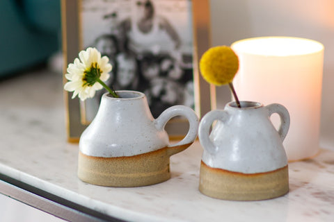 bud vases on side table 