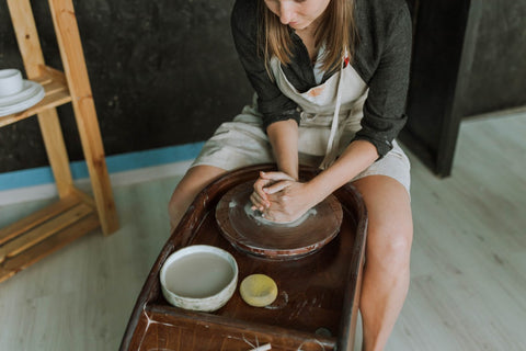 making pottery at the wheel