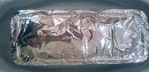 Loaf of spam in foil