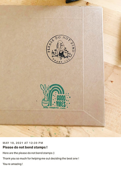 Inked stamp designs in black and green shown on brown craft paper